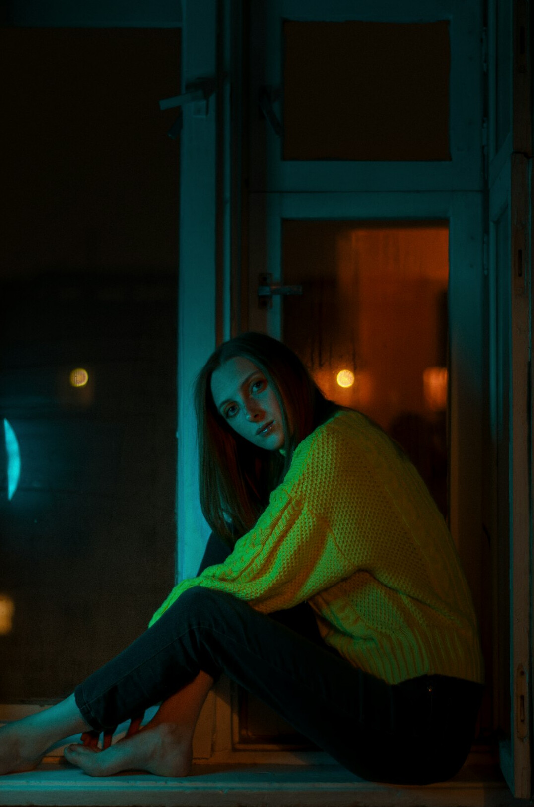 woman in dark room