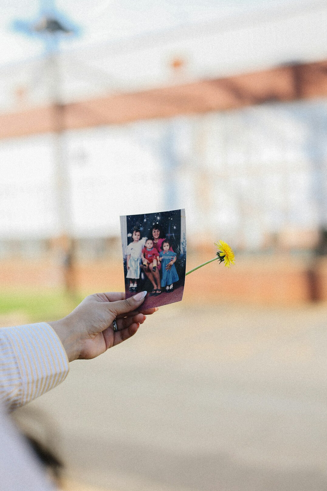family holding missing person photo